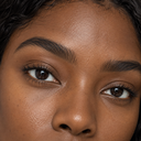 Brow styling close-up — AI illustration; shade appearance is illustrative