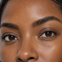 Brow styling close-up — AI illustration; shade appearance is illustrative