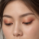 Eyeshadow styling close-up — AI illustration; shade appearance is illustrative