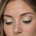 Eyeshadow styling close-up — AI illustration; shade appearance is illustrative