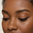 Eyeliner styling close-up — AI illustration; shade appearance is illustrative
