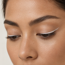 Eyeliner styling close-up — AI illustration; shade appearance is illustrative