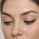 Eyeliner styling close-up — AI illustration; shade appearance is illustrative