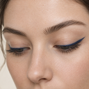 Eyeliner styling close-up — AI illustration; shade appearance is illustrative
