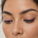 Eyeliner styling close-up — AI illustration; shade appearance is illustrative