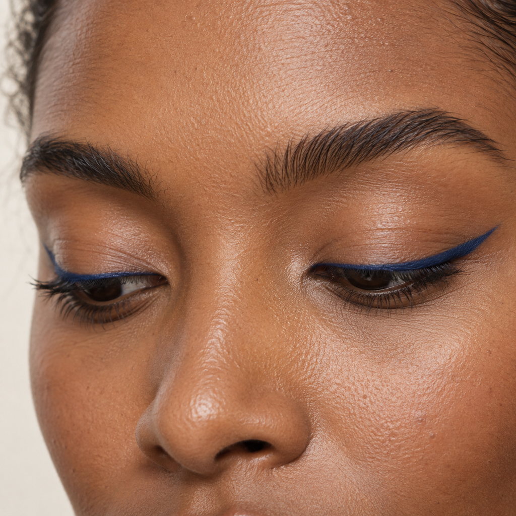 Eyeliner styling close-up — AI illustration; shade appearance is illustrative