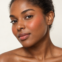 Face makeup styling close-up — AI illustration; shade appearance is illustrative