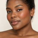 Face makeup styling close-up — AI illustration; shade appearance is illustrative