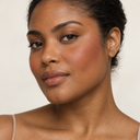 Face makeup styling close-up — AI illustration; shade appearance is illustrative