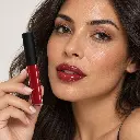 hy-lp-gls-0027-burgundy-letter-lip-gloss-deep-red-1078-wear.webp