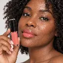 hy-lp-gls-0016-amber-glow-lip-gloss-coral-1067-wear.webp