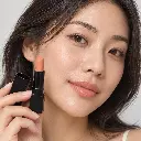 hy-lp-lst-0221-marigold-interlude-lipstick-peach-1555-wear.webp